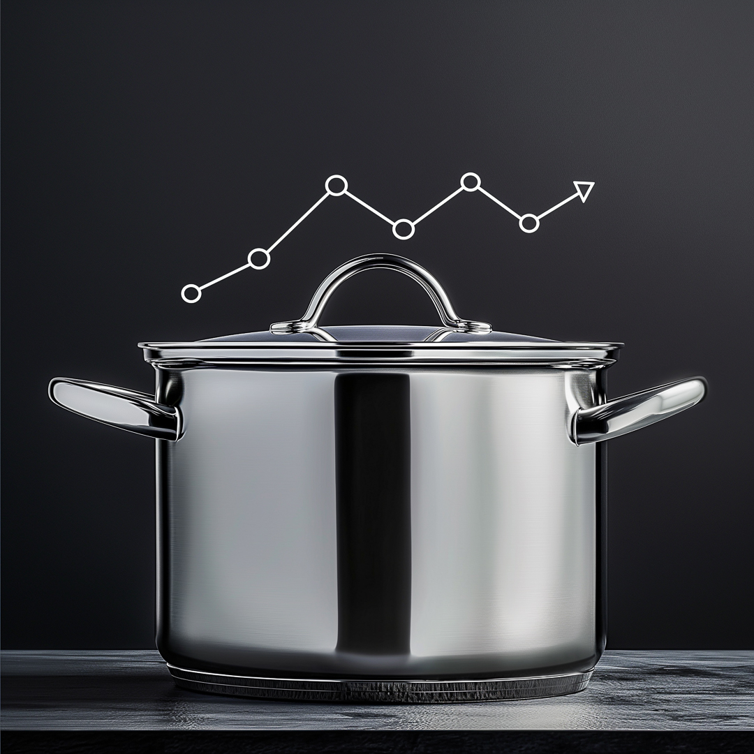 A stainless steel cooking pot with a trend line