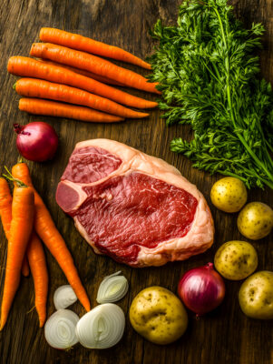 Raw Ribeye Steak with Vegetables